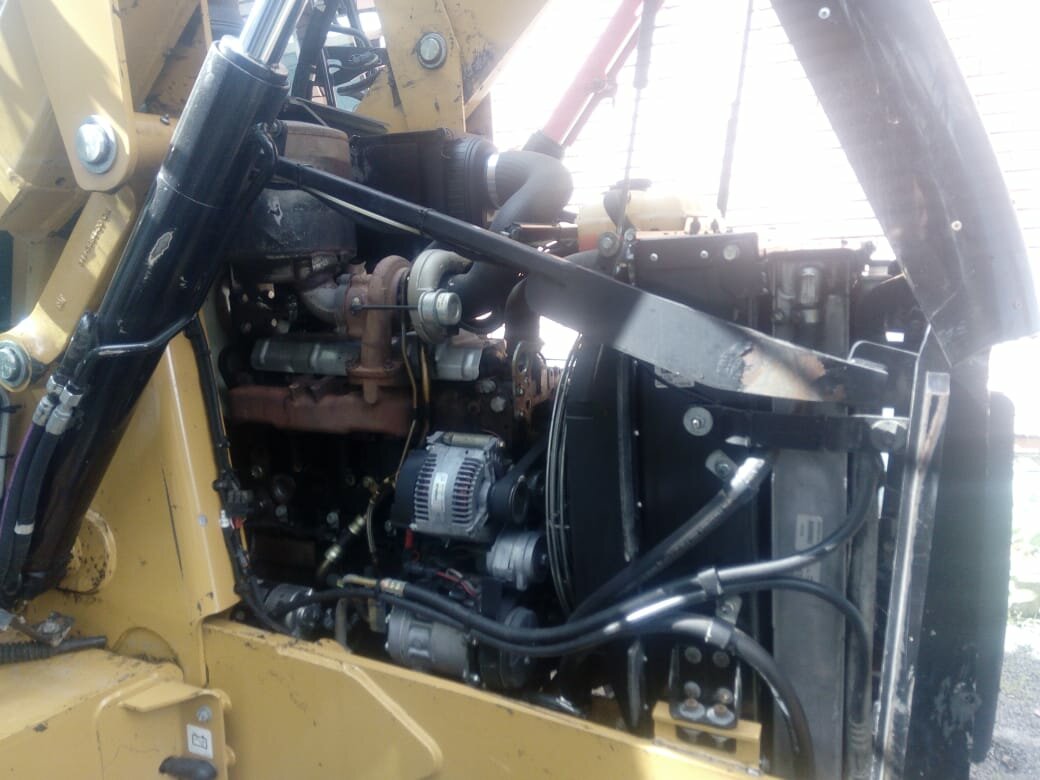 caterpillar фронтальный погрузчик в кабине, двигатель jcb 4cx, двигатель на джон дир 325, perkins caterpillar 428, двигатель джон дир 325k