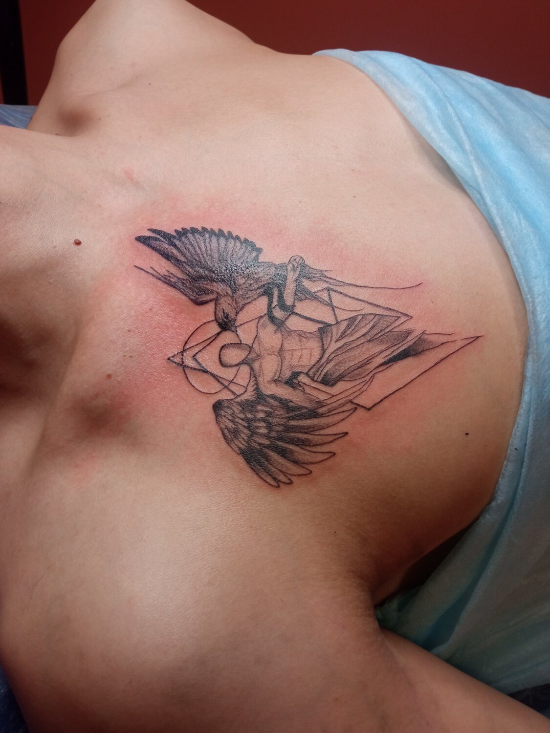 Тату (татуировки) Ангел на груди: значение и эскизы для девушек и мужчин