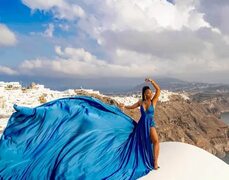 Neka on Instagram: "In the place of my dreams with the man of my dreams. 💙 💙 💙 #LiveYourLife #flyingdresses #blackgirlluxury