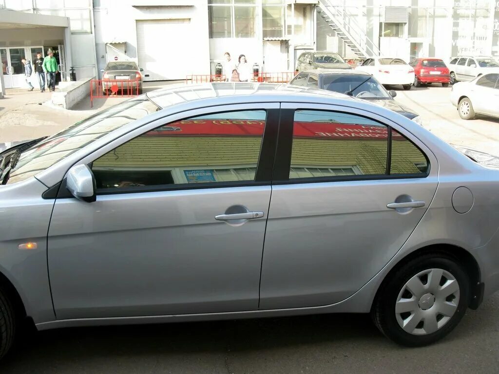 Llumar atn 20. Prius 20 тонировка двойное стекло. Suntek infinity 50. Тонировка серая зеркальная. Зеркальная цветная тонировка.