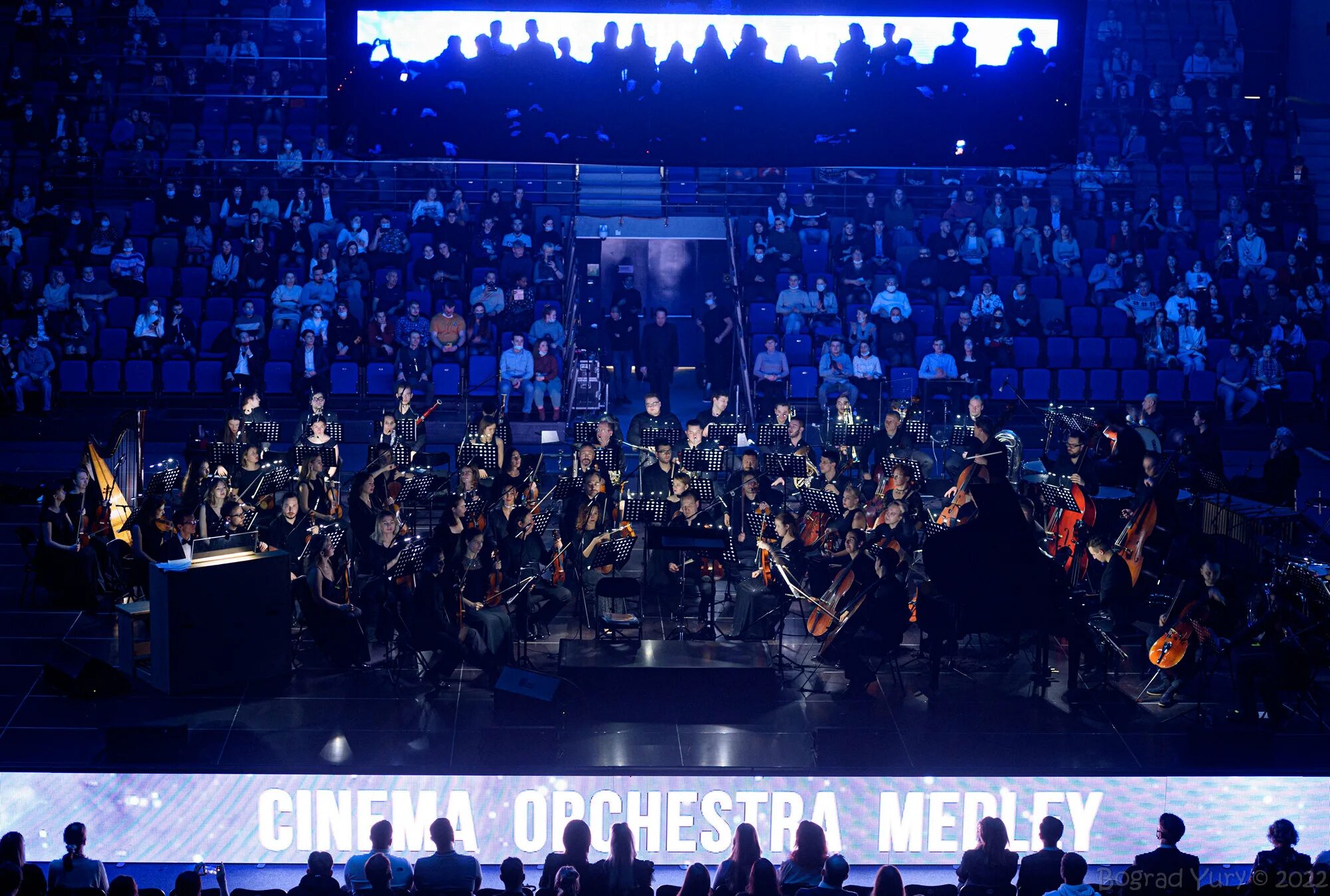 City orchestra. Тинькофф Арена Cinema Orchestra Medley. Cinema Orchestra Medley Крокус. Imperial Orchestra СПБ. М1 Арена симфонический оркестр.