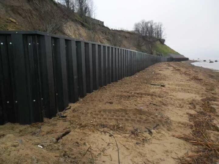 Панели шпунтовые сварные пшс. Larsen sheet pile шпунт. Укрепление берега шпунтом ларсена. Шпунтовое ограждение ларсен. Шпунтовое ограждение ларсен.