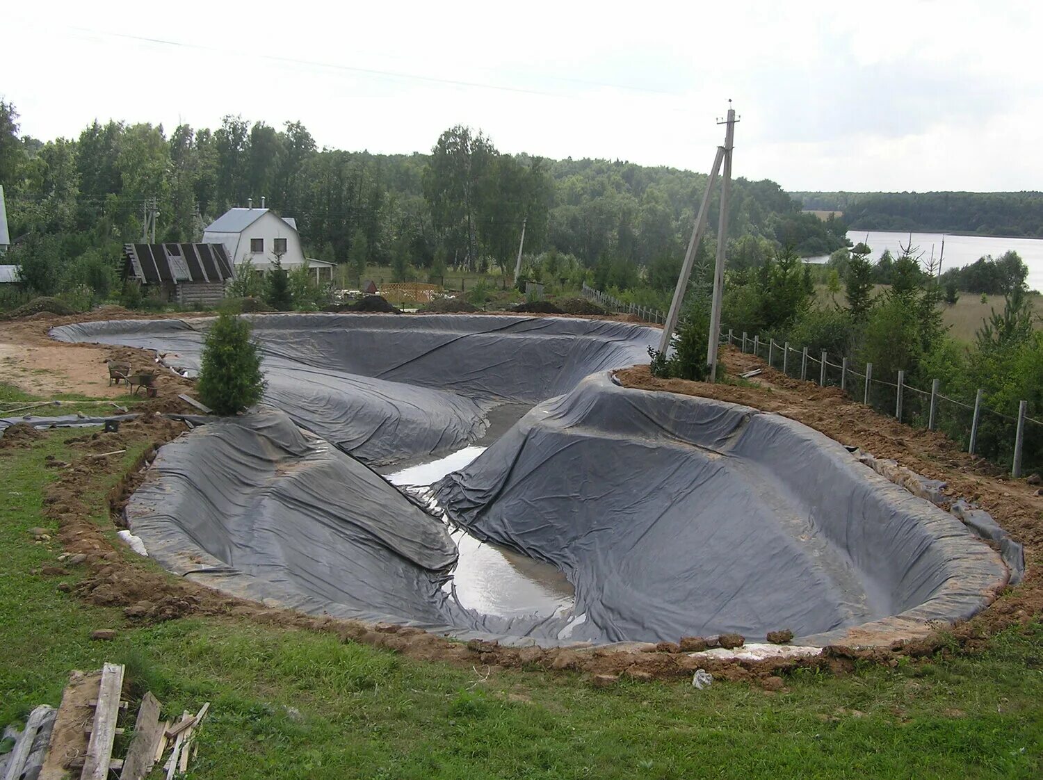 Участок для купания. Гидроизоляция водохранилищ и прудов геомембрана. Постройка пруда. Искусственное озеро. Искусственный пруд большой.