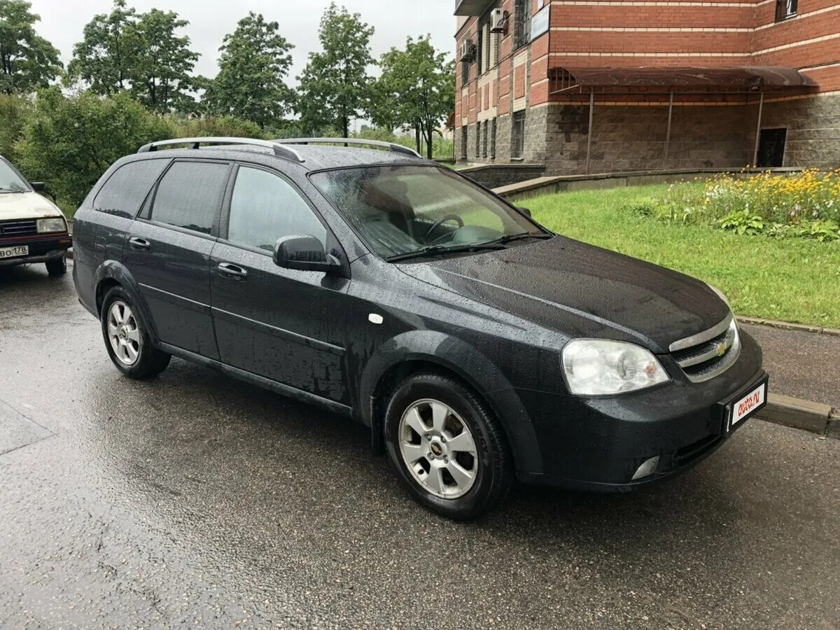 Лачетти универсал отзывы. Шевроле Лачетти универсал 1.6. Chevrolet Lacetti 2011 универсал черный. Chevrolet Lacetti 2013 универсал. Шевроле Лачетти универсал черный 1.6 механика.