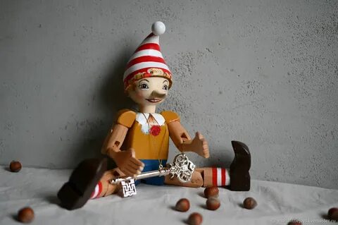 Игрушка буратино