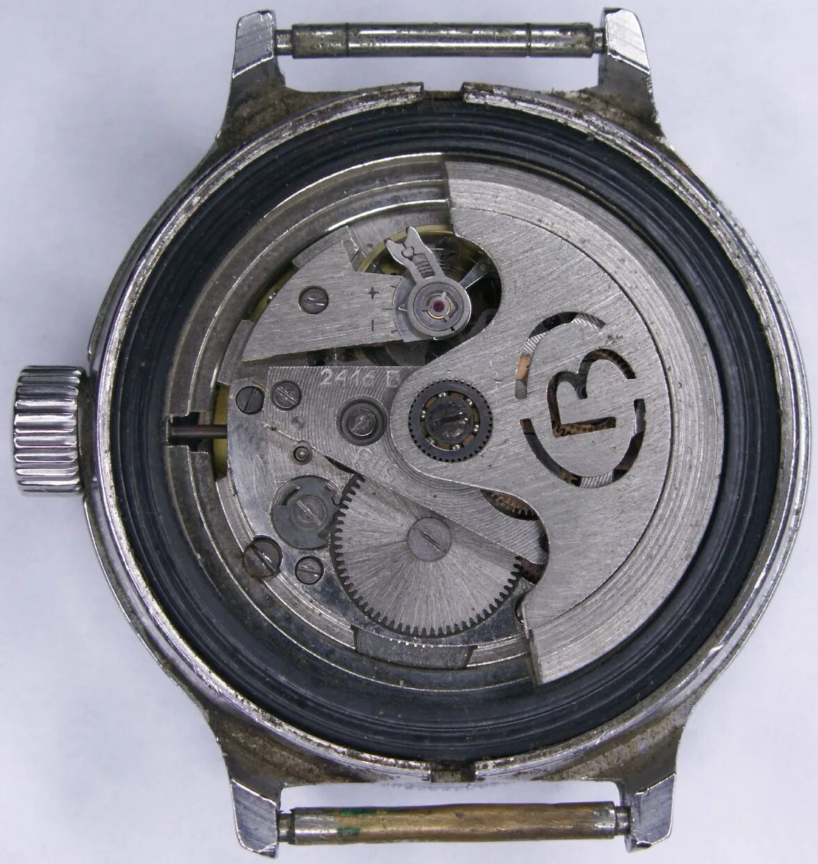 калибр 2209 восток. часы восток ччз 18 камней. механизм часов восток 2414. наручные часы восток амфибия. восток 2409 механизм.