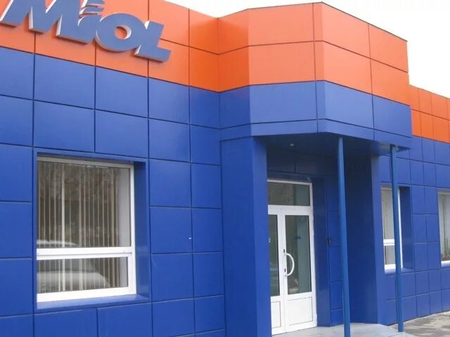 Строительный магазин фасад. Фасад для магазина желтый и синий. Желтый фасад белинского 62 томск. Цвета фасадов магазинов. Сине желтый магазин.