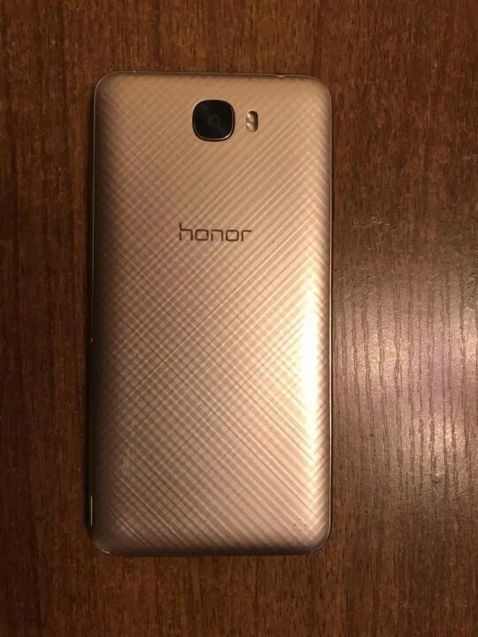 Телефон хонор бу. Хонор 5. Хонор 5 золотой. Honor 5a Gold. Honor 5a Nanoreview.