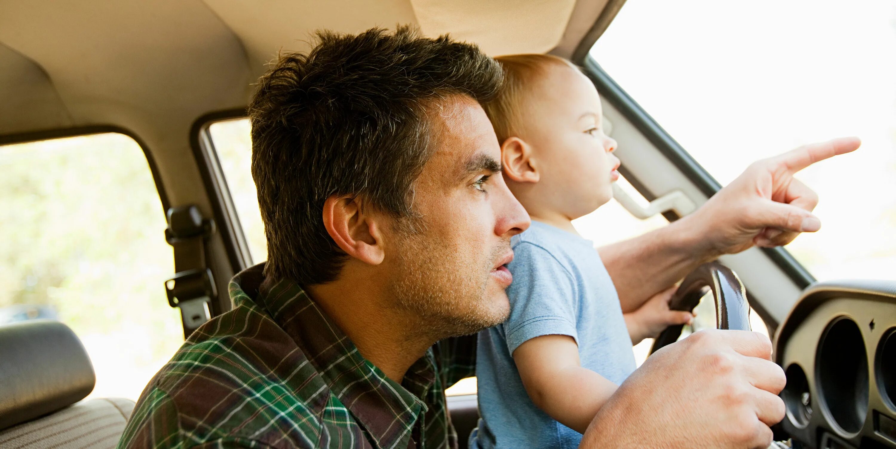 Dad driving a car