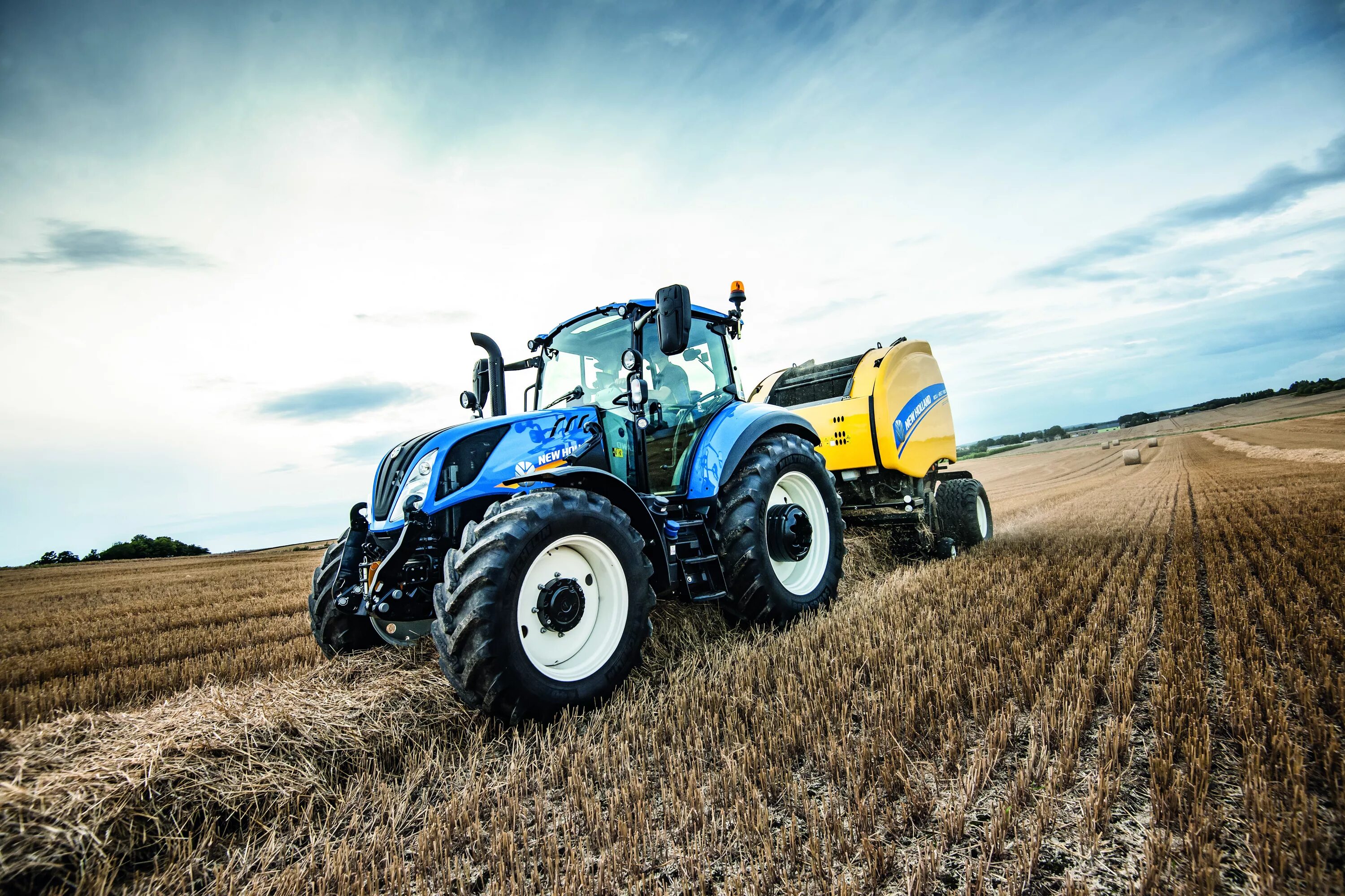 New holland t. Трактор New Holland. Сельхозтехника Нью Холланд. Техника Нью Холланд трактора. Тракторы t4000 New Holland.