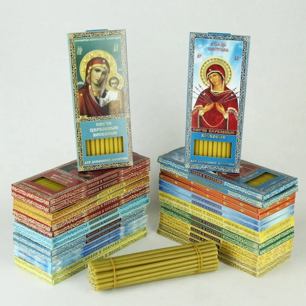 свечи церковные восковые. свечной бизнес. желтые церковные свечи.