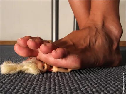 a woman named Julie crushing a doll with her foot.