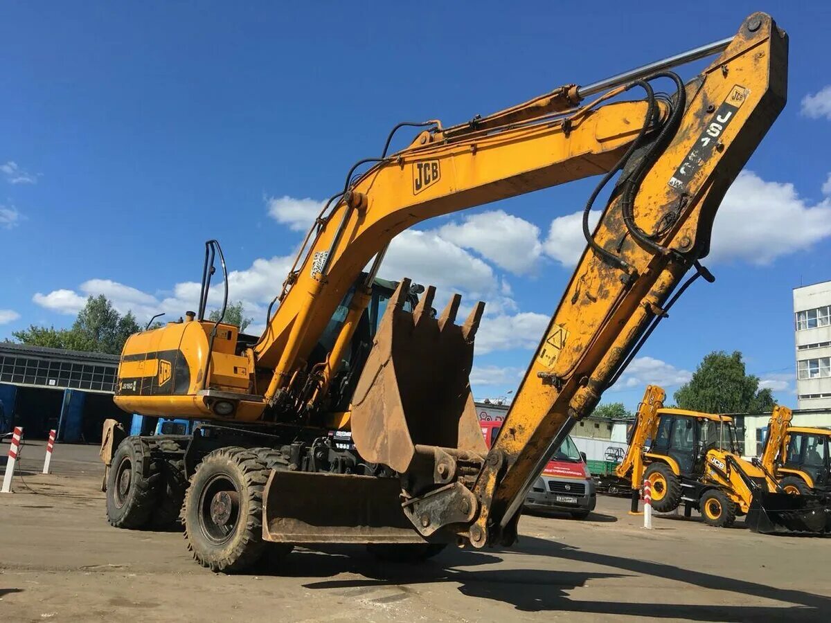 Jcb экскаватор купить б у. JCB js160w. Экскаватор JCB js160w. JCB 160 колесный. JCB 160 колесный экскаватор.