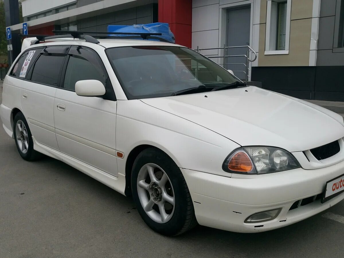 Тойота калдина поколения. Toyota Caldina t210. Калдина Тойота 2000 2.0. Toyota Caldina универсал 1992. Toyota Caldina 210 модель.