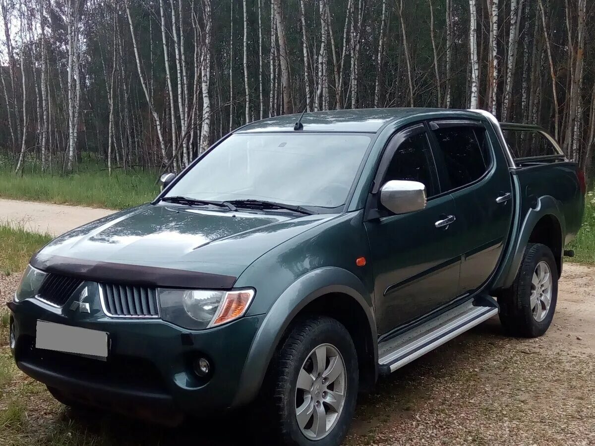 Мицубиси л200 с пробегом. Митсубиси l200. Митсубиси л200 2008. Mitsubishi l200 2.5 2008. Mitsubishi l200 зеленый.