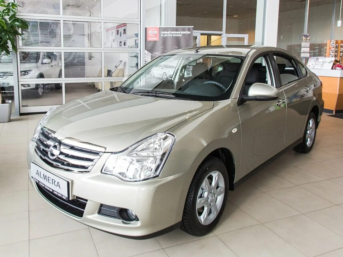 Nissan tiida 2013. Ниссан альмера 2013г. Тиида рестайлинг хэтчбек бежевый. Nissan g15 2005. Ниссан альмера 2016.