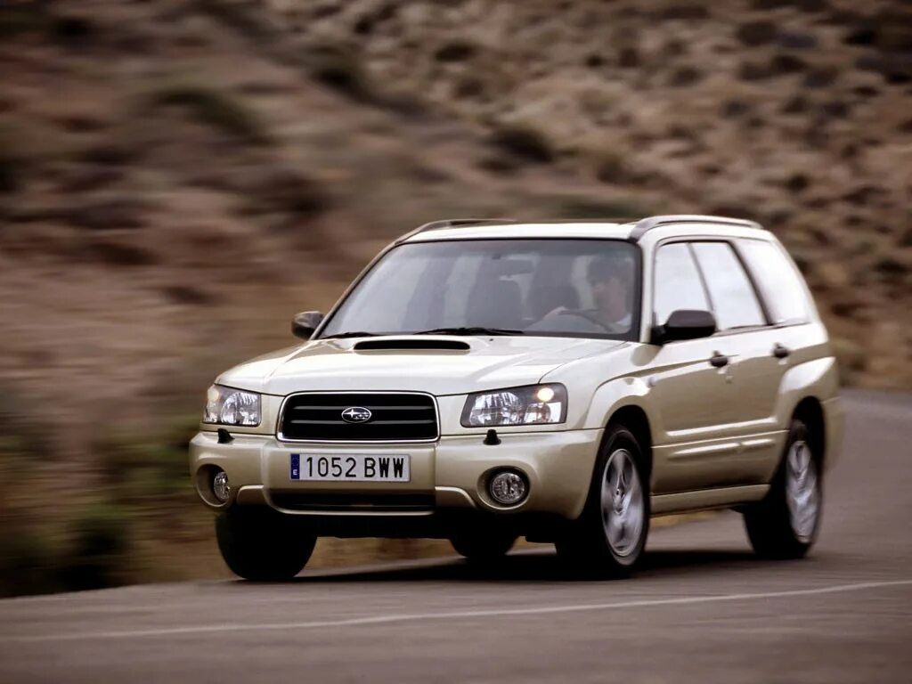 Субару форестер какие поколения. Subaru Forester 2.0XT 2005. Subaru Forester II 2002. Subaru Forester XT 2002. Субару Форестер поколения 2003.