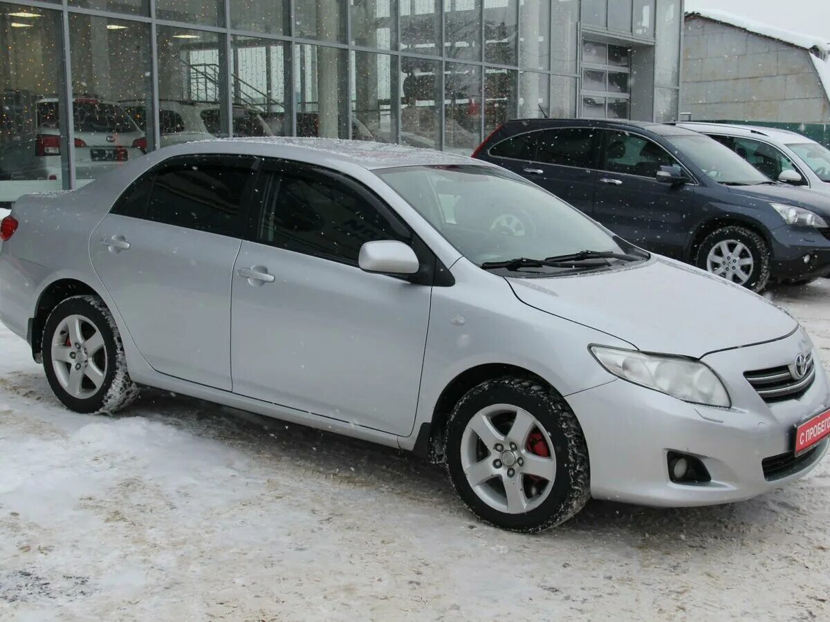 Купить тойоту короллу в новокузнецке. Toyota Corolla 2007. Toyota Corolla e140 2007. Тойота Королла 2007 серебристая. Тайотакололла 2007.