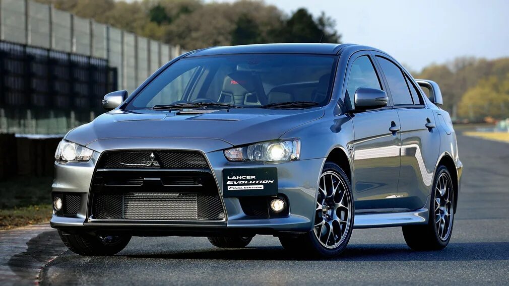 Японский мицубиси. Мицубиси Лансер Эволюшн. Mitsubishi Lancer Evolution 10. Mitsubishi Lancer Evolution Final Edition. Mitsubishi Lancer Evolution 11.