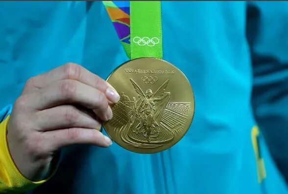 Золотая медаль номер. Олимпийские медали. Олимпийские награды. Олимпийская Золотая медал.