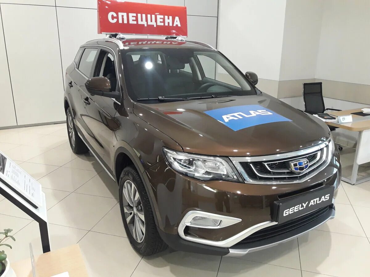 Купить джили атлас 2. Geely Atlas 2019 коричневый. Джили атлас 22. Geely Atlas искрящийся коричневый. Джили атлас Сургут.