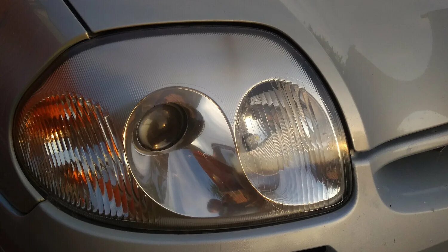 Замена ламп ближнего света - Renault Clio III, 1,2 л, 2006 года электроника DRIV