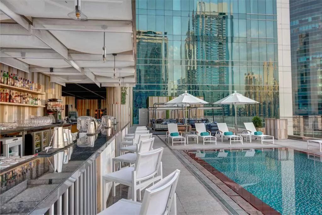 Pullman downtown. Пулман даунтаун дубай. pullman dubai downtown 5. отель pullman dubai downtown. pullman dubai downtown бассейн.