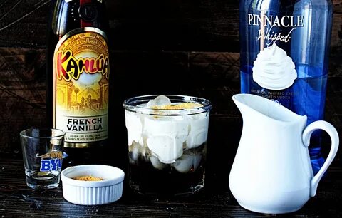 Cereal Milk, vodka, and French Vanilla Kahlua really take up this classic c...