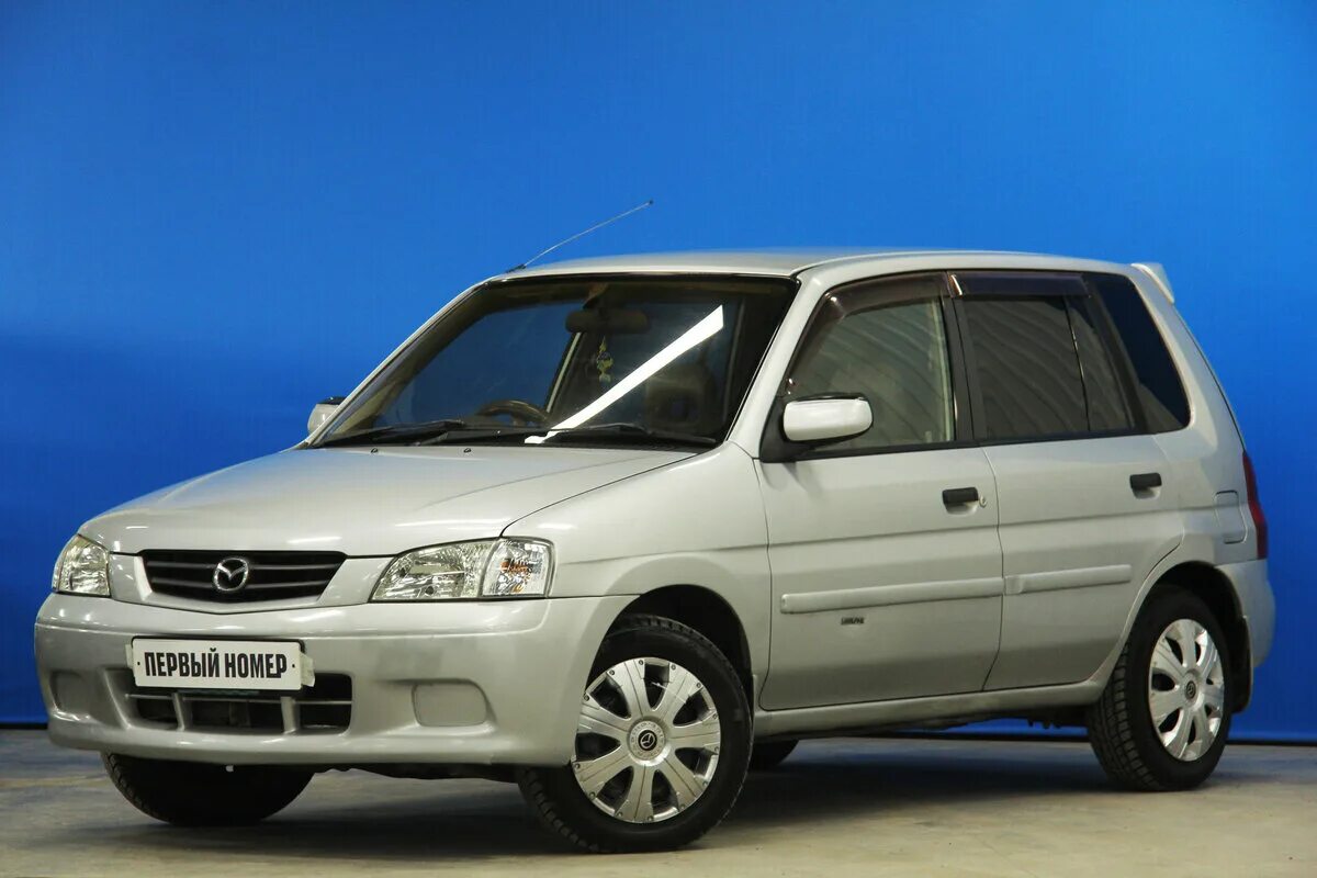 5. мазда демио 1 поколение. Mazda demio 1999.