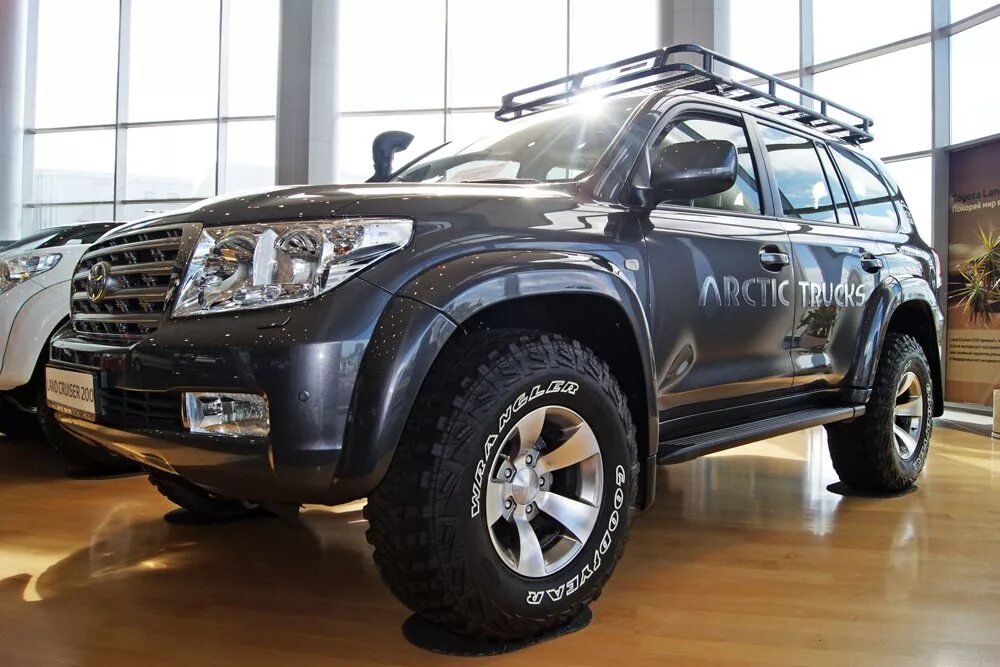 Арктик тракс отзывы. Toyota land cruiser 150 arctic trucks. Hilux arctic trucks at35. Toyota land cruiser 200 arctic trucks. Toyota land cruiser prado 120 arctic trucks.