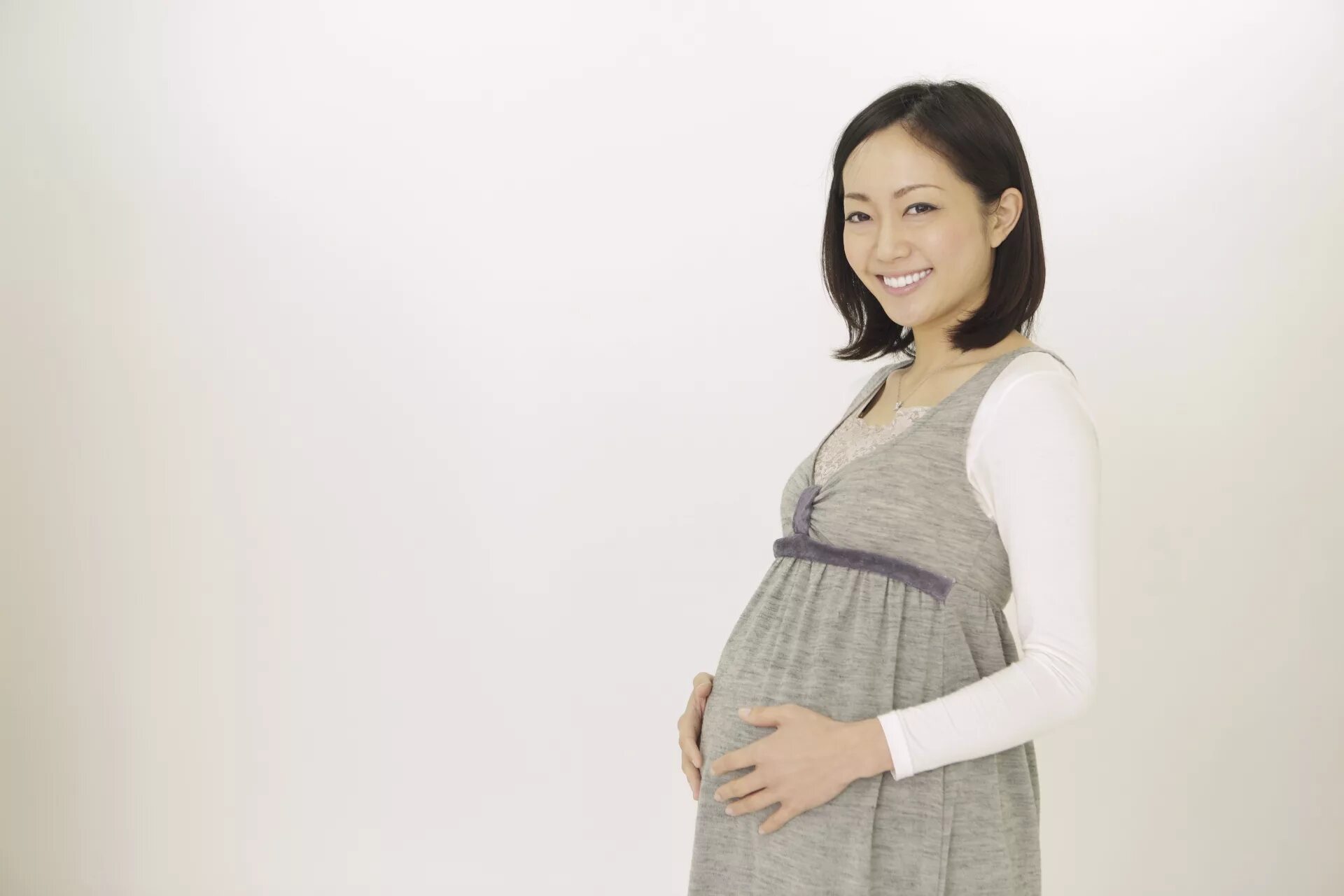 Китайский беременность. Беременная азиатка. Беременная китаянка. Беременная женщина азиатка.