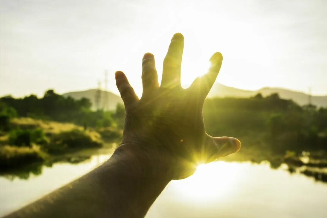 Could use a hand. Hands to sun. hand over sunlight. hand closes sun. life by the sun.