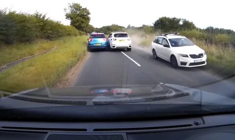 Near miss for Porsche after overtaking two cars on country road blind.