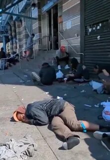 The footage shows the streets littered with slumped-over and