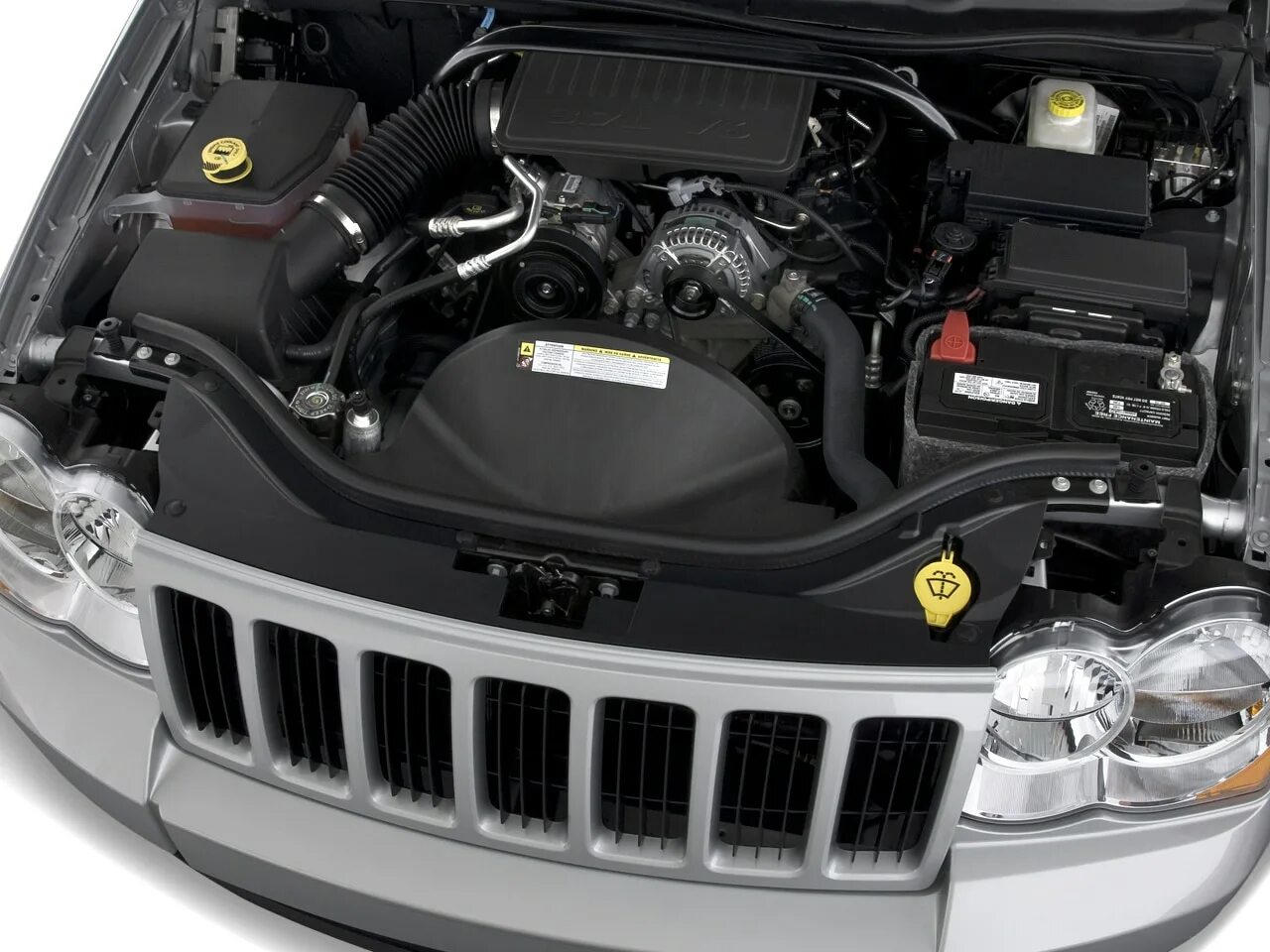 1.3 литра двигатель. Jeep Grand Cherokee 2012 под капотом. Джип Гранд Чероки 2011 3,6 аккумулятор. Jeep Grand Cherokee IV 2014 аккумулятор. Jeep Grand Cherokee wk1 3.7.