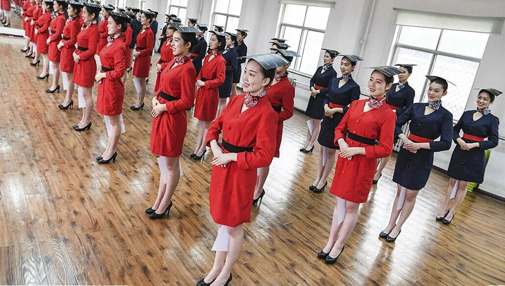 Школа китайских стюардесс. Китайские стюардессы подготовка. Подготовка стюардесс в Китае. Стюардессы Китая.