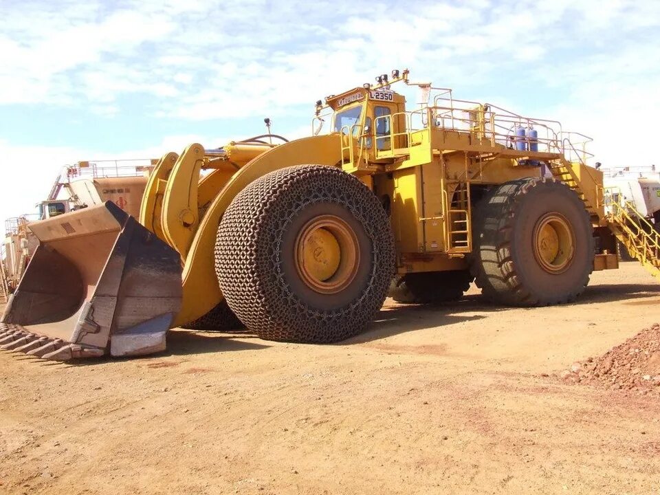 Летурно l2350. L2350 погрузчик. Погрузчик Letourneau l 2350 характеристики. Komatsu d575a-3 SD. Сборник больших машин