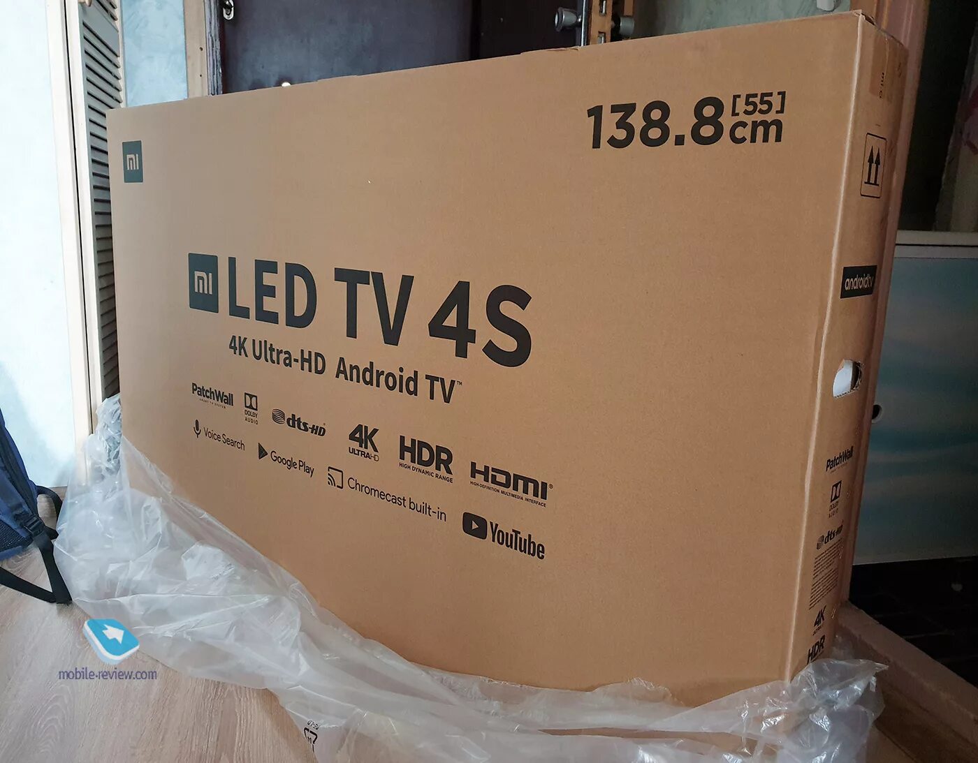 Упаковка телевизора. Упаковка телевизор Сяоми. Коробка от телевизора. Сяоми телевизор коробка.