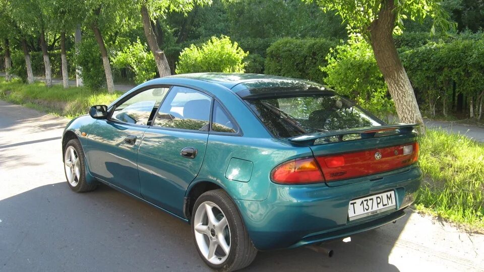 Мазда 323 f хэтчбек. Мазда 323 f ba зеленая. mazda 323 ba. мазда 323 лифтбек. mazda 323 ba хэтчбек.