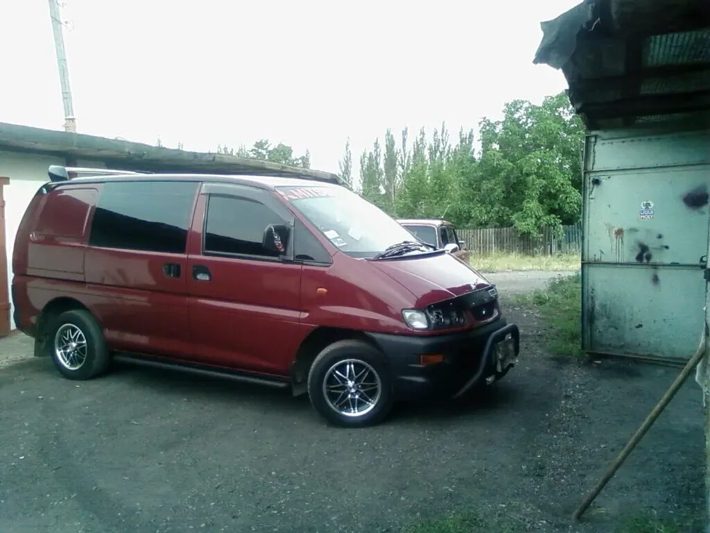 Mitsubishi l400. Митсубиси l400 2000г. Мицубиси л400 комплектация. Митсубиси l400 модификация.