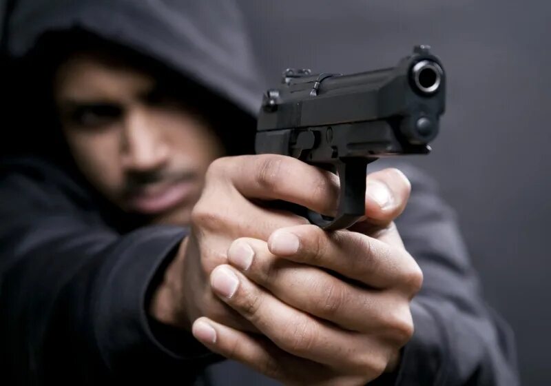 Man with a gun. Man with a gun