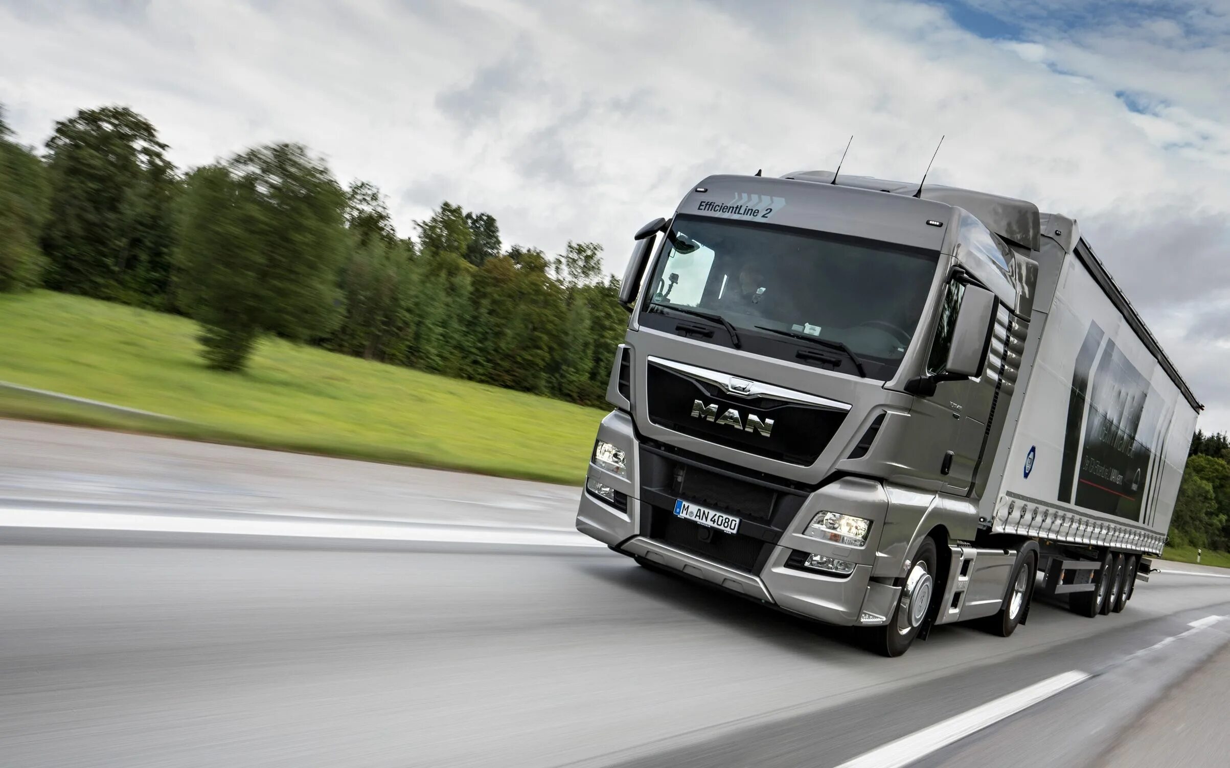 Ман фото. Man TGX EFFICIENTLINE 3. Грузовик man TGX. Ман ТГХ efficient line 2. EFFICIENTLINE man TGX.