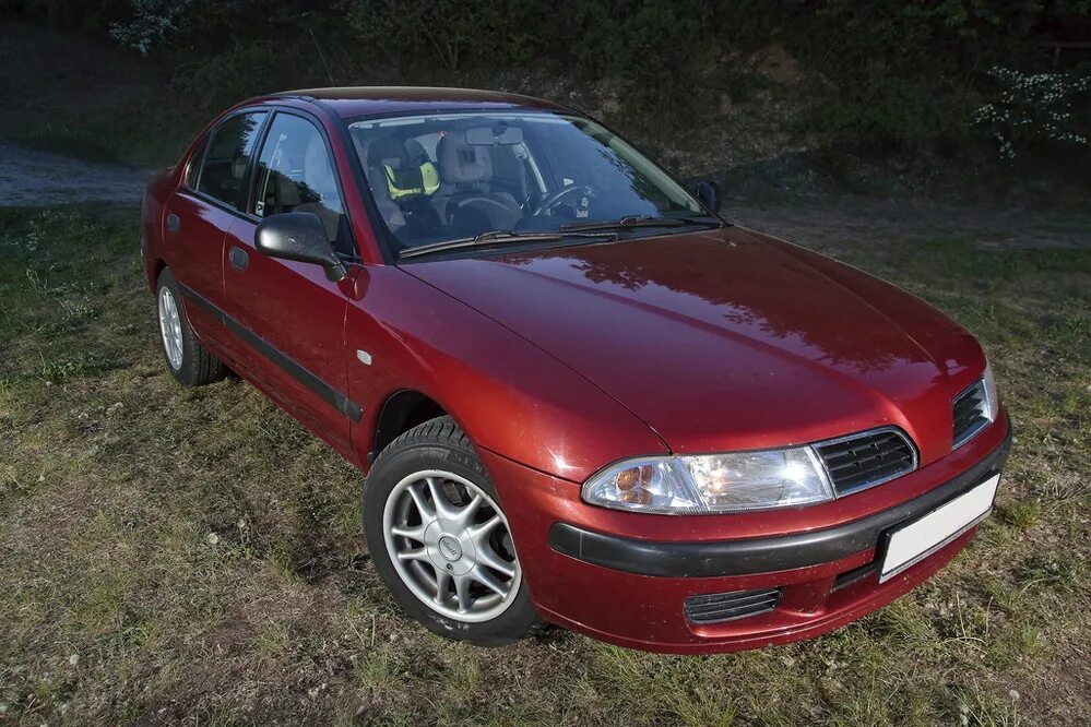 Carisma. Митсубиси Каризма. Митсубиси Каризма 1. Мицубиси Каризма хэтчбек. Mitsubishi Carisma 1 поколение.