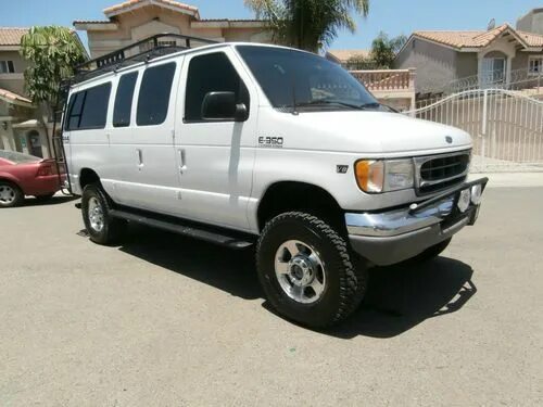 Форд дизель б у. Ford e350 van 2002. Ford e350 13 мест. Форд дизель. Форд е 350 тюнинг.