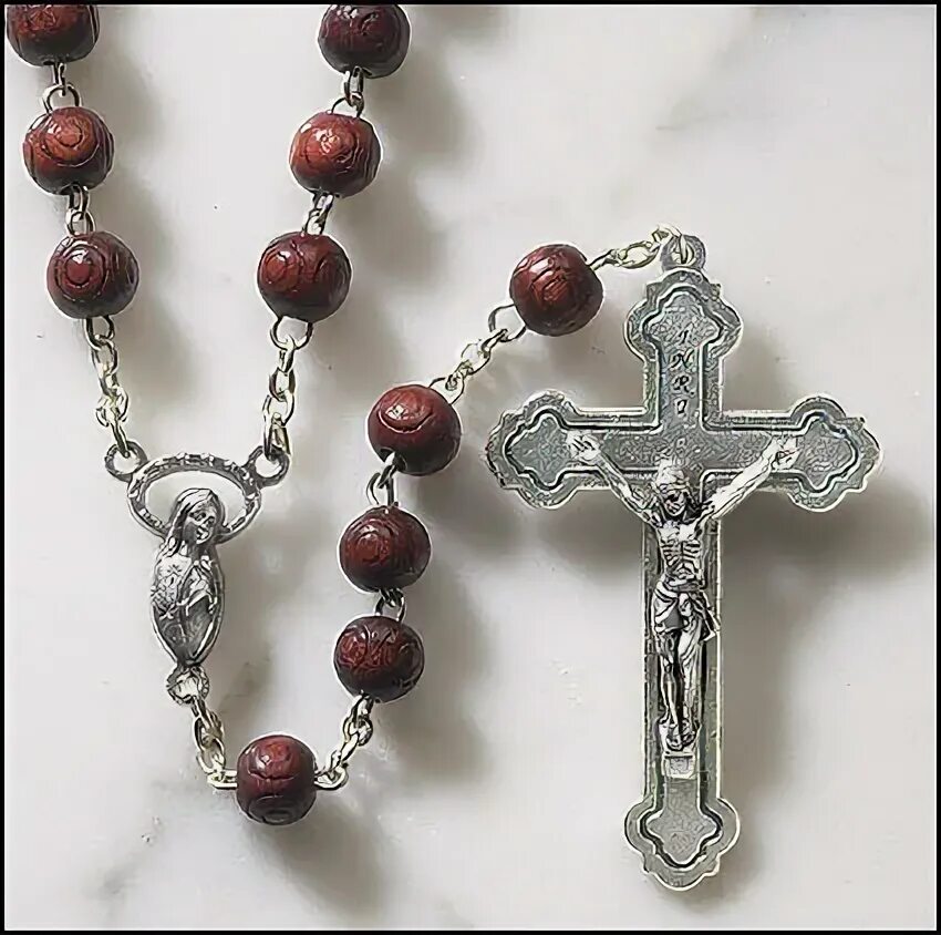 Розарий на палец. Rosary. Розарий браслет католический. Православный крестик в руке. Католический ружанец.