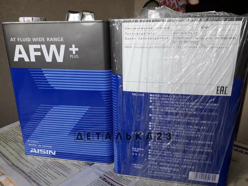 Atf производитель. AISIN ATF AFW+ 1л. Масло ATF AISIN AFW+ 20 Л. AISIN at-f6004. Масло AISIN AFW+ atf6004.