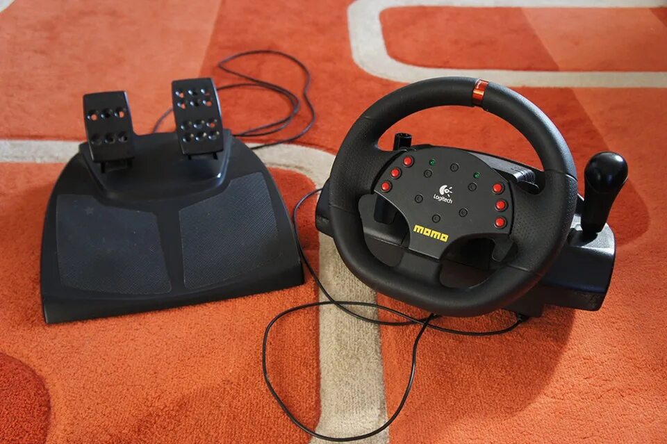 Momo racing купить. Руль Logitech Momo. Руль логитеч МОМО. Logitech Profiler Momo Racing. G25 Momo Racing.