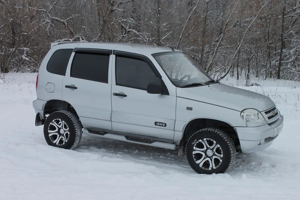 Нива лифт 50мм. Chevrolet Niva лифт. Лифт Нива Шевроле 50 мм. Лифт Нива Шевроле 30мм. Chevrolet Niva лифт 50.