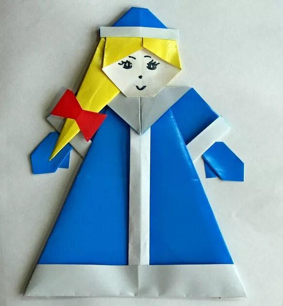 Оригами снегурочка. Дед мороз и снегурочка из конуса бумаги. Поделка снегурочка из бумаги. Оригами снегурочка из бумаги схема. Как делать из бумаги снегурочку.