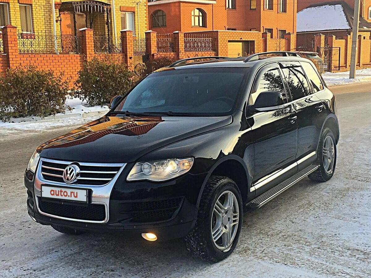 Фольксваген туарег бензин купить. Фольксваген Туарег черная 2007. Volkswagen Touareg 2007 черный. Volkswagen Touareg 2008 черный. Черный Фольксваген Туарег 2006 года.